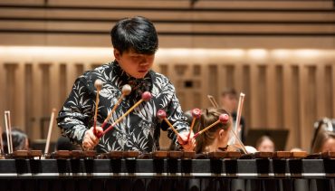 Fang leads Chetham's Symphony Orchestra on the marimba, February 2020, in The Stoller Hall