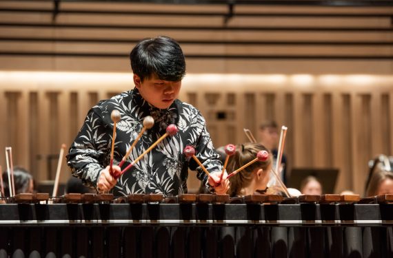 Fang leads Chetham's Symphony Orchestra on the marimba, February 2020, in The Stoller Hall